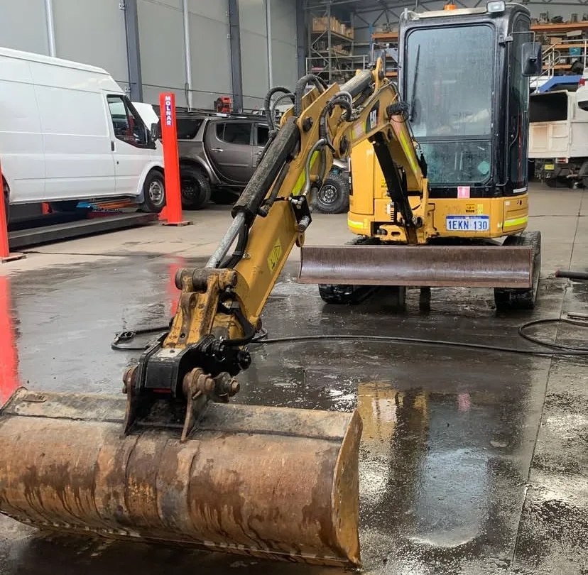 CAT mini excavator in the Driveline Gears workshop for service